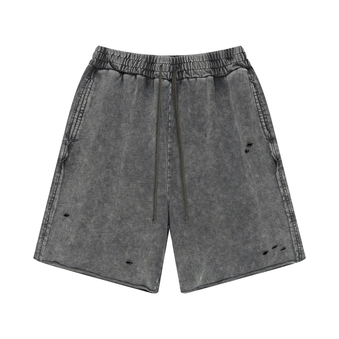 Gray cotton shorts front - artisan dye-wash technology and distressed detailing for suppliers