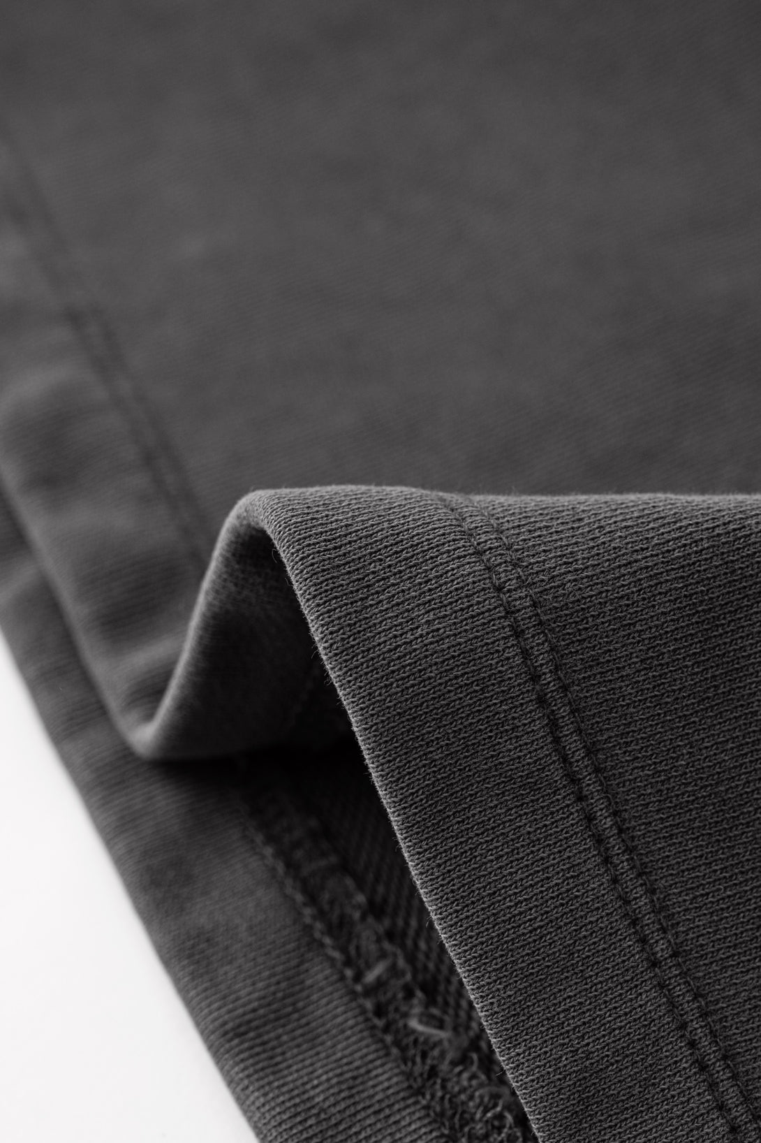 Hem detail of Gray cotton skirt - reinforced stitching with built-in shorts construction