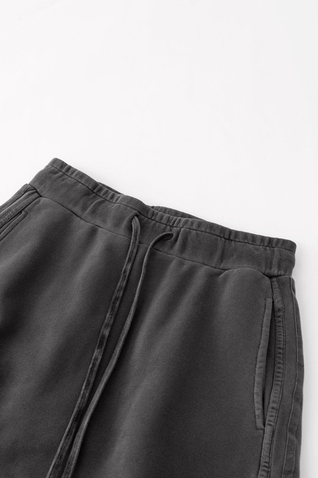 Gray skirt waistband close-up - elasticated with pigment-dye finish for durability