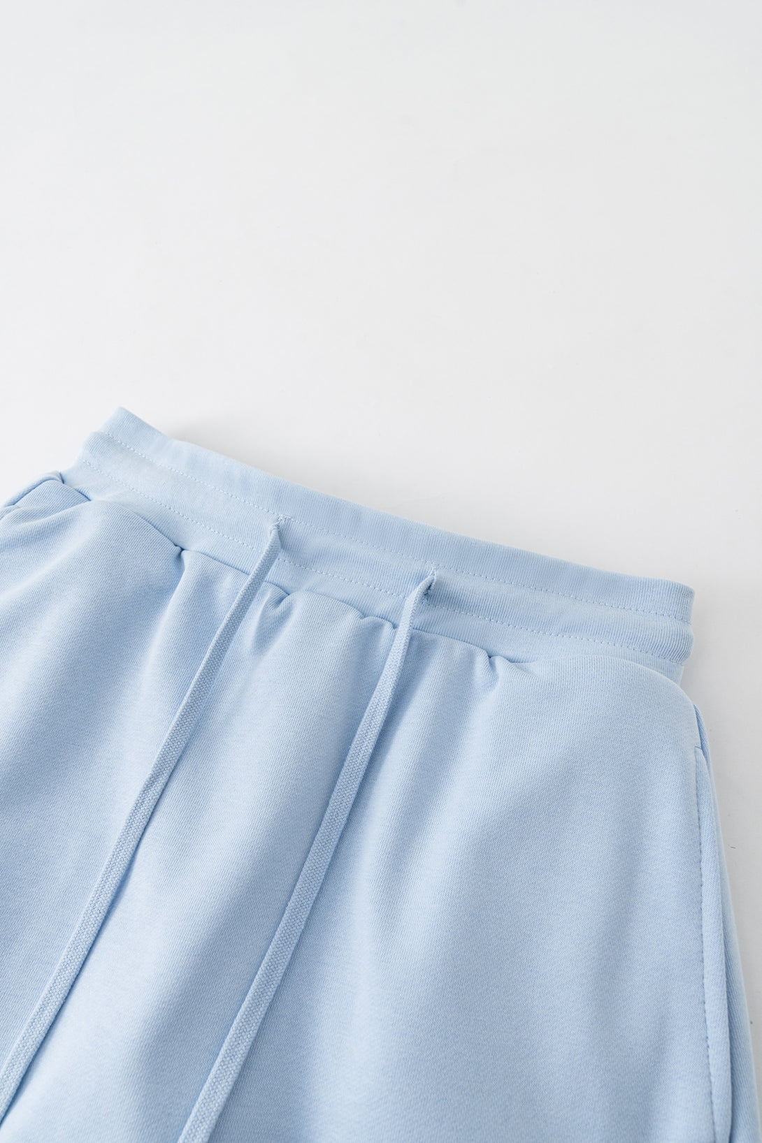 Light Blue skirt waistband close-up - elasticated with moisture-wicking lining for durability