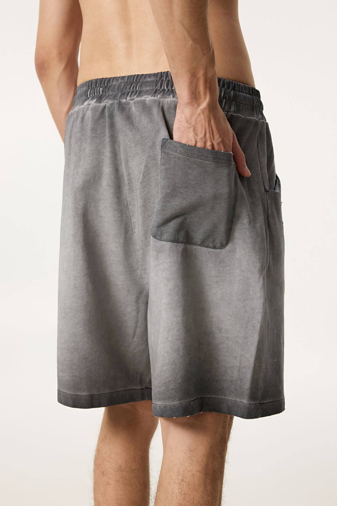 Reinforced flatlock seam detail on coffee shorts - industrial strength stitching