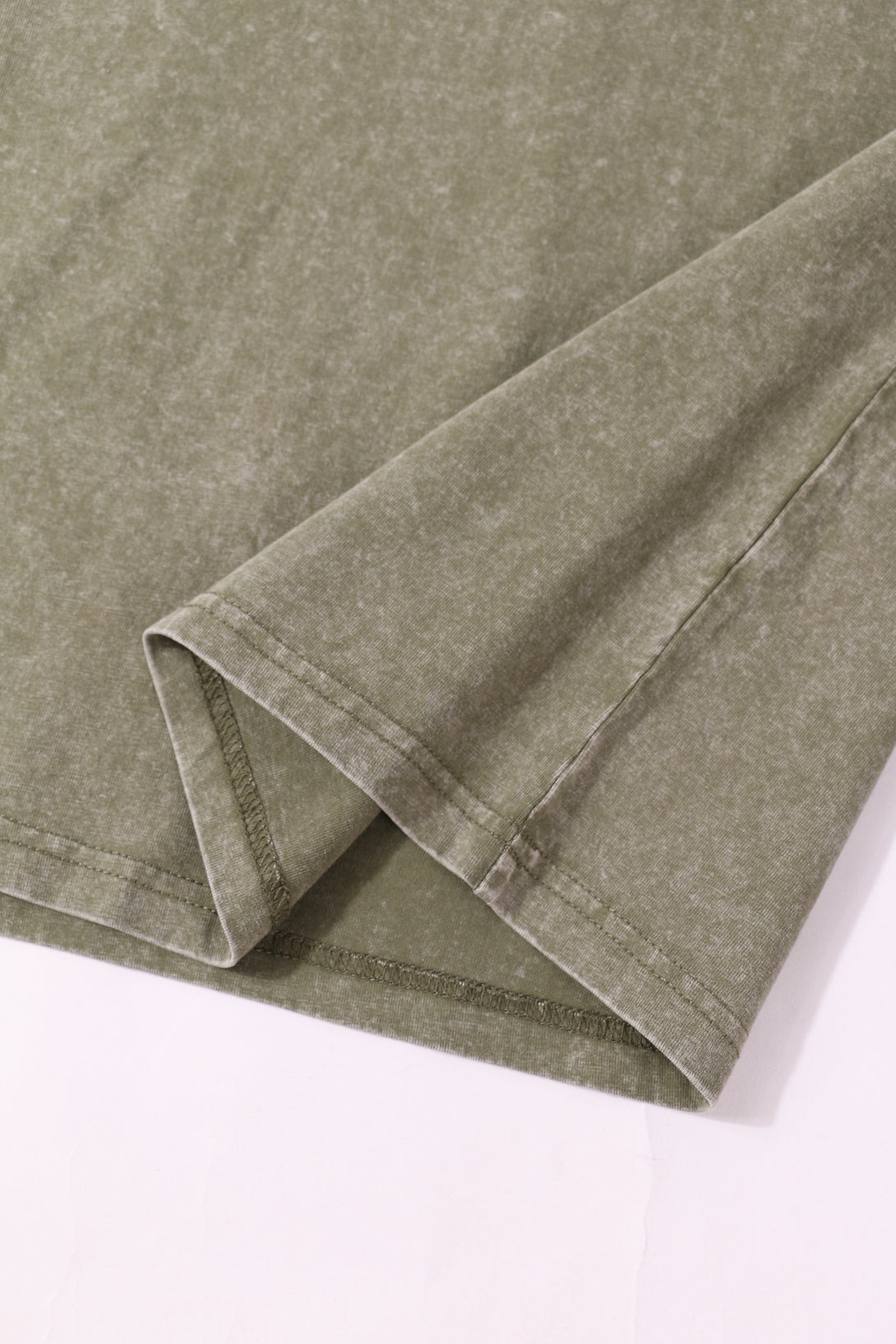 Close-up showing the strong side seam construction of the 230G Cotton vintage long-sleeved T-shirt.