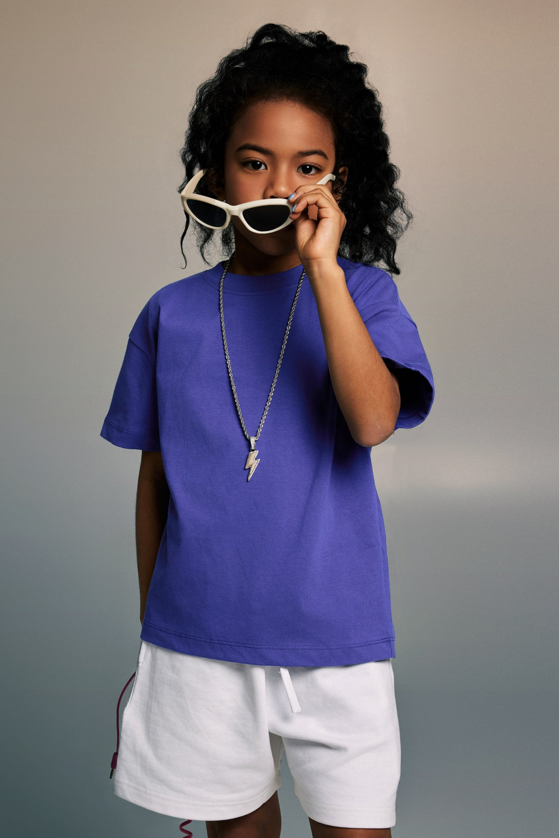 Child Wearing Violet Blue Cooling UV Protection T-Shirt