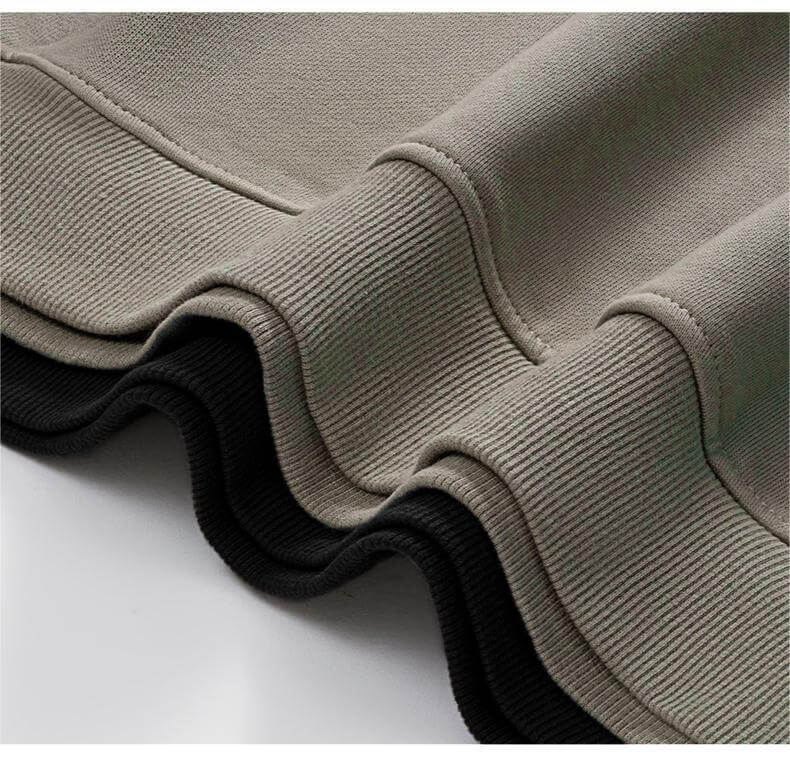Close-up of the hem and cuffs of a Blank Oversized Hoodie showing premium fabric quality and design.