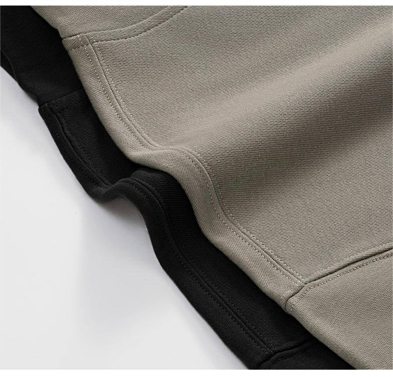 Blank Oversized Hoodie fabric detail showcasing gray and black colors, highlighting premium cotton texture and construction.