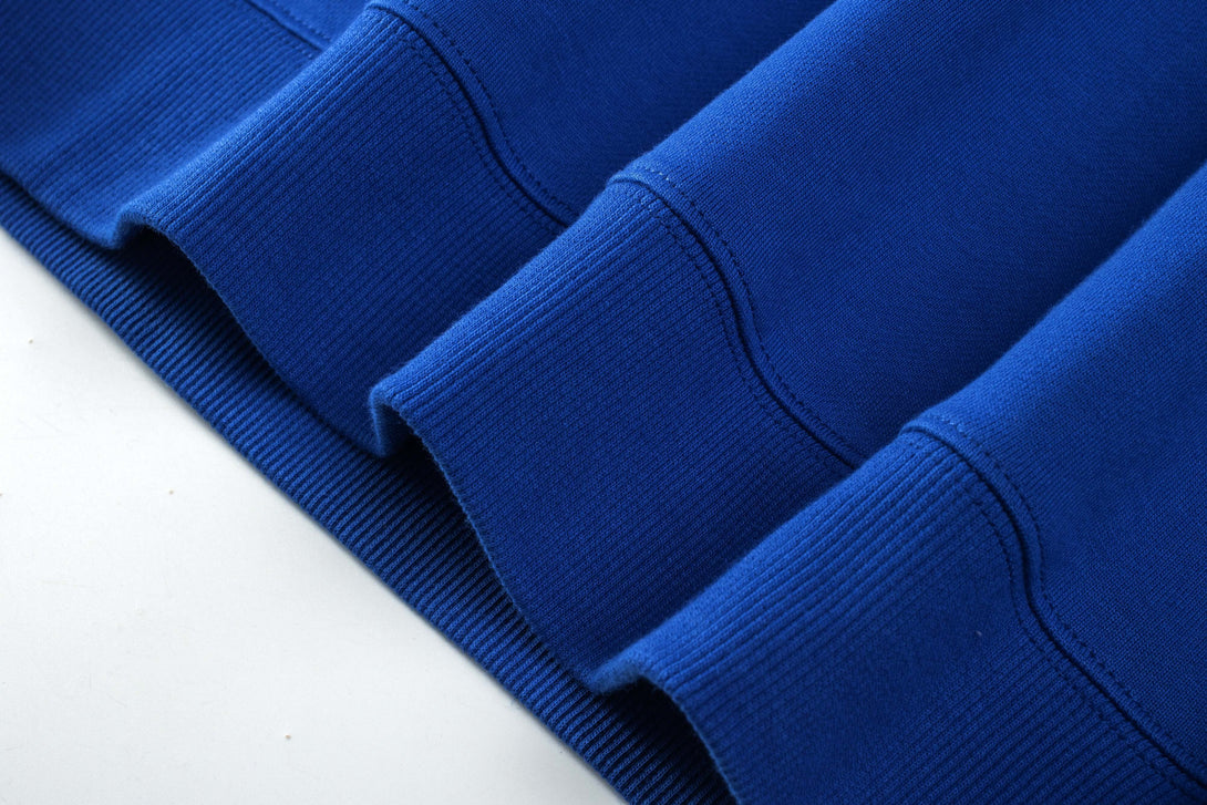 Hem stitching detail of cotton crewneck pullover