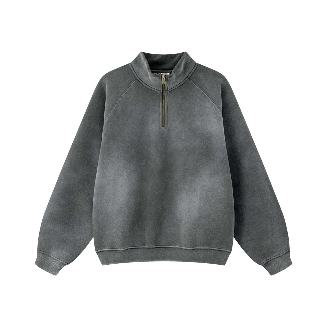 Spray Effect Quarter Zip pullover in gray with stand-up collar and 1/4 zip design, showcasing urban streetwear style.
