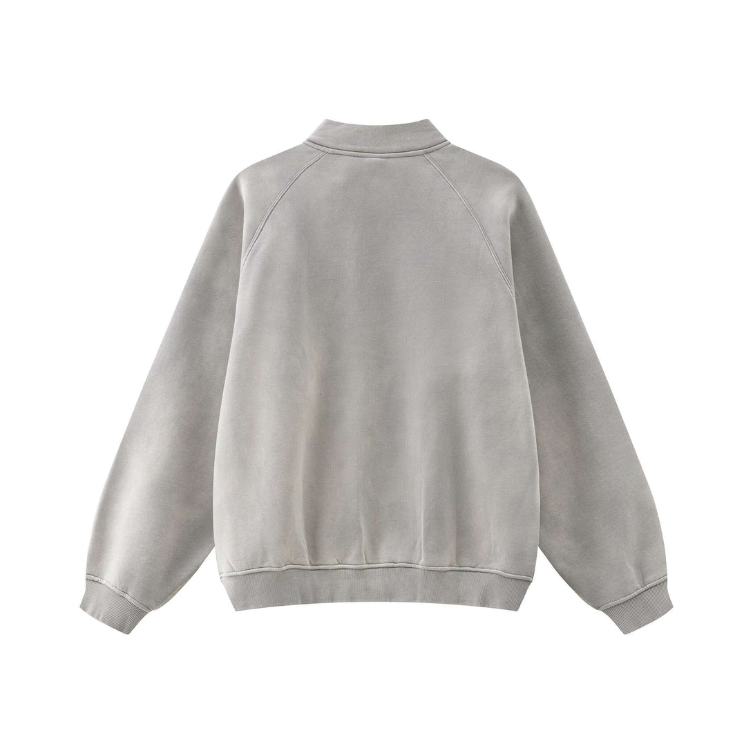 Back view of the Spray Effect Quarter Zip in gray, featuring a stand-up collar and relaxed fit, perfect for urban style.