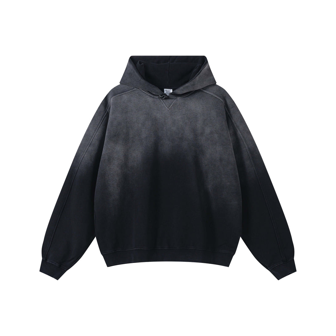 Vintage Spray Paint Hoodie showcasing a unique distressed design and oversized drop shoulder style.