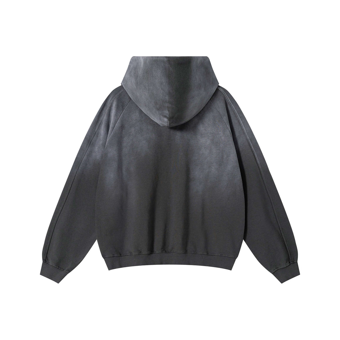 Back view of Vintage Spray Paint Hoodie showcasing oversized drop shoulder design and unique spray paint patterns.