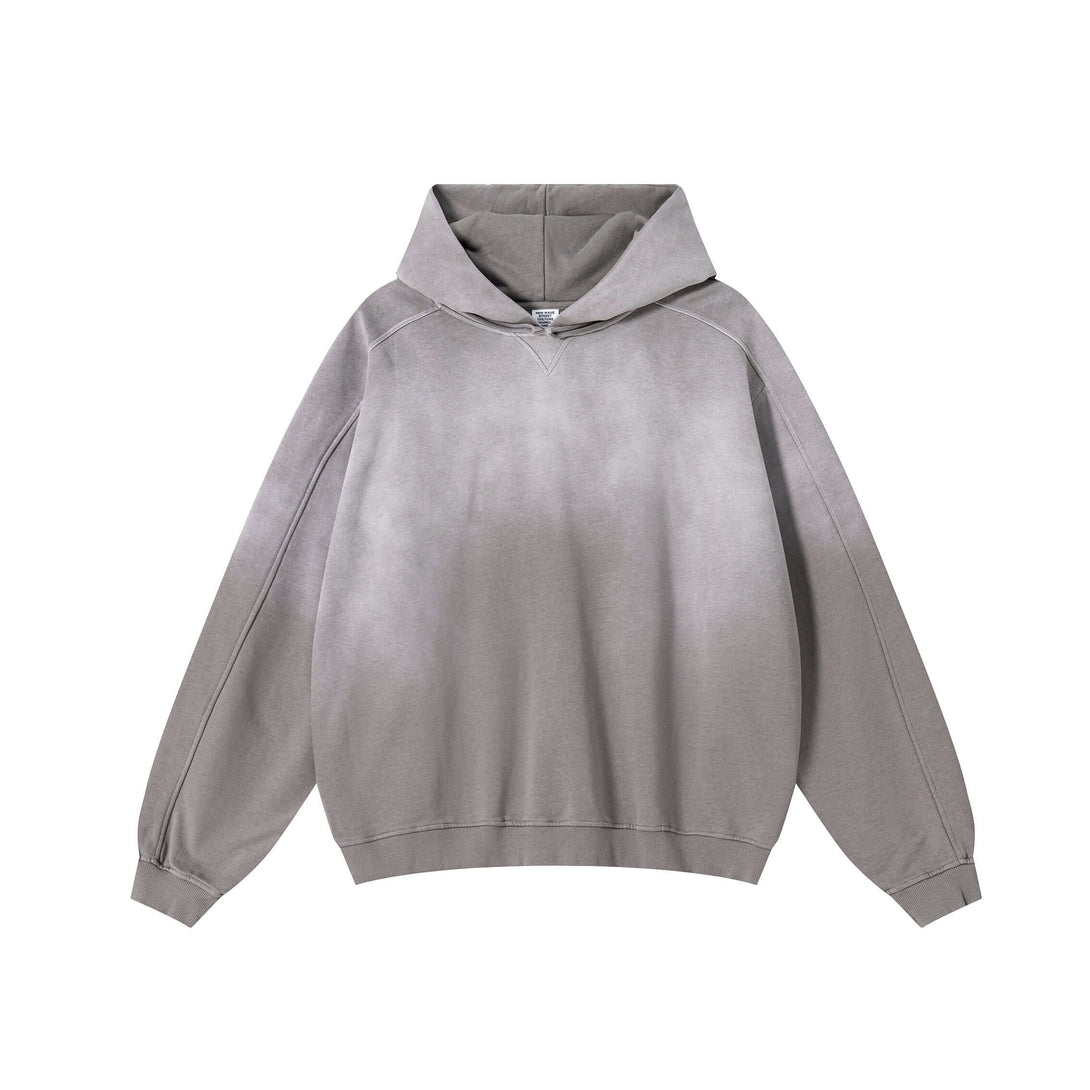 Vintage Spray Paint Hoodie in gray showcasing oversized drop shoulder design and unique distressed details.