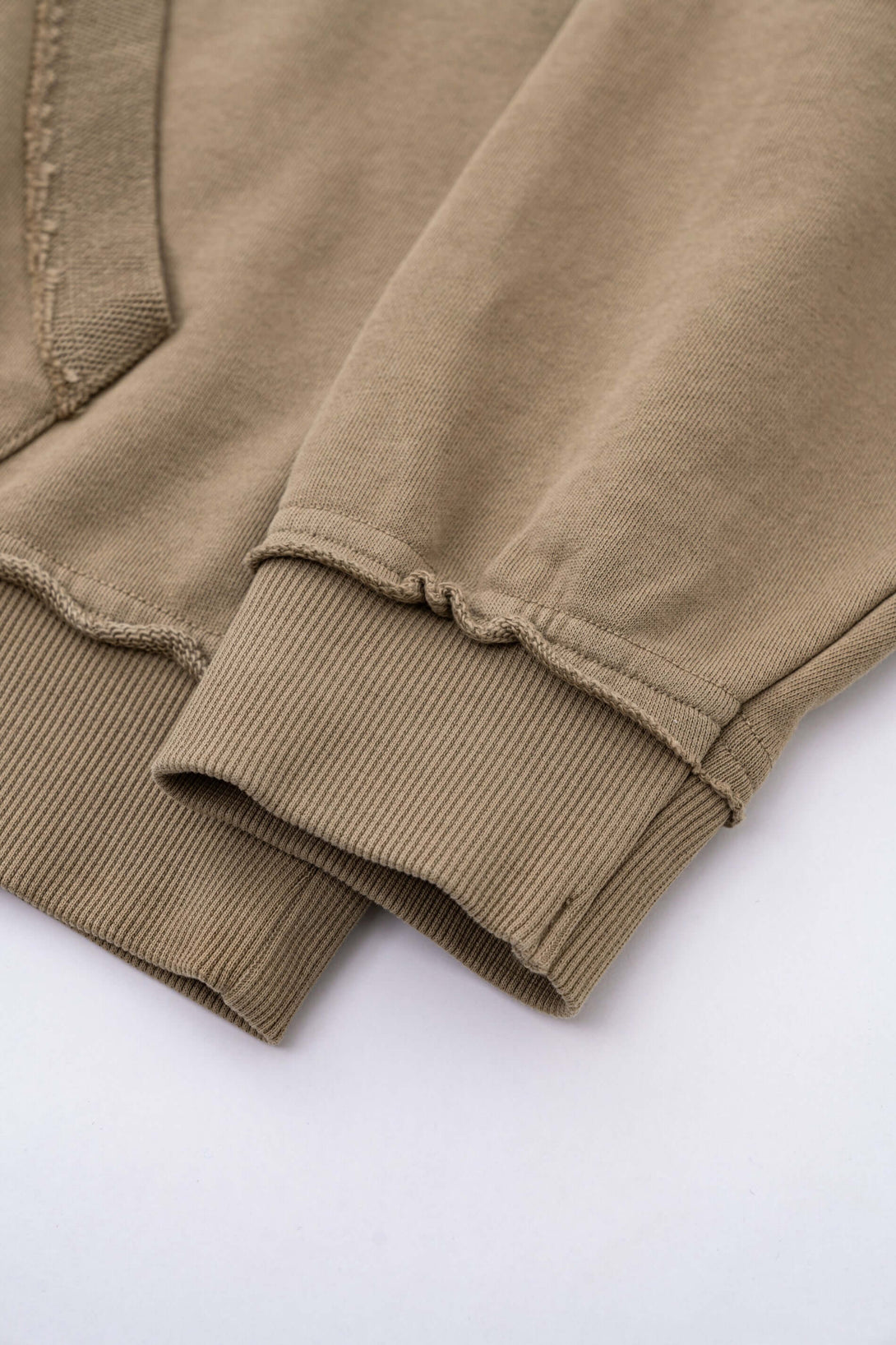 Close-up of Vintage Batik Hoodie showing raw edge and distressed detailing on sleeves.