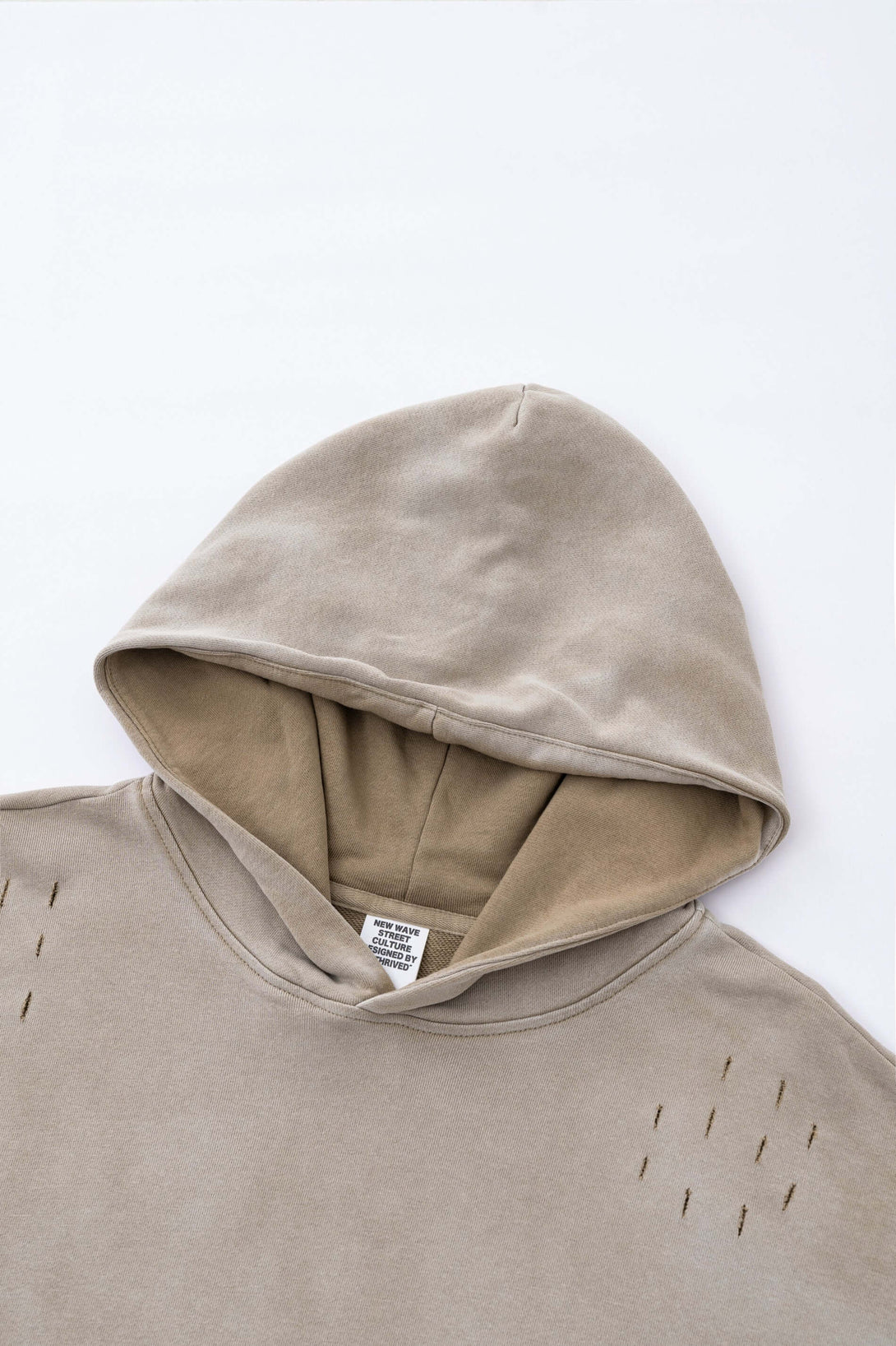Vintage Batik Hoodie with distressed details and raw edge, showcasing unique batik patterns and urban aesthetic.