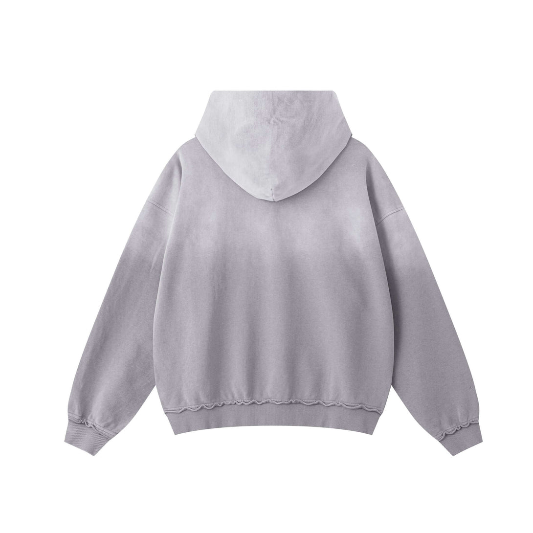Back view of Vintage Batik Hoodie showcasing its unique gray color and raw edge detailing.