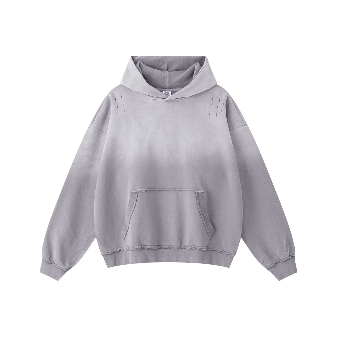 Vintage Batik Hoodie showcasing a distressed washed design with raw edge details and oversized fit.