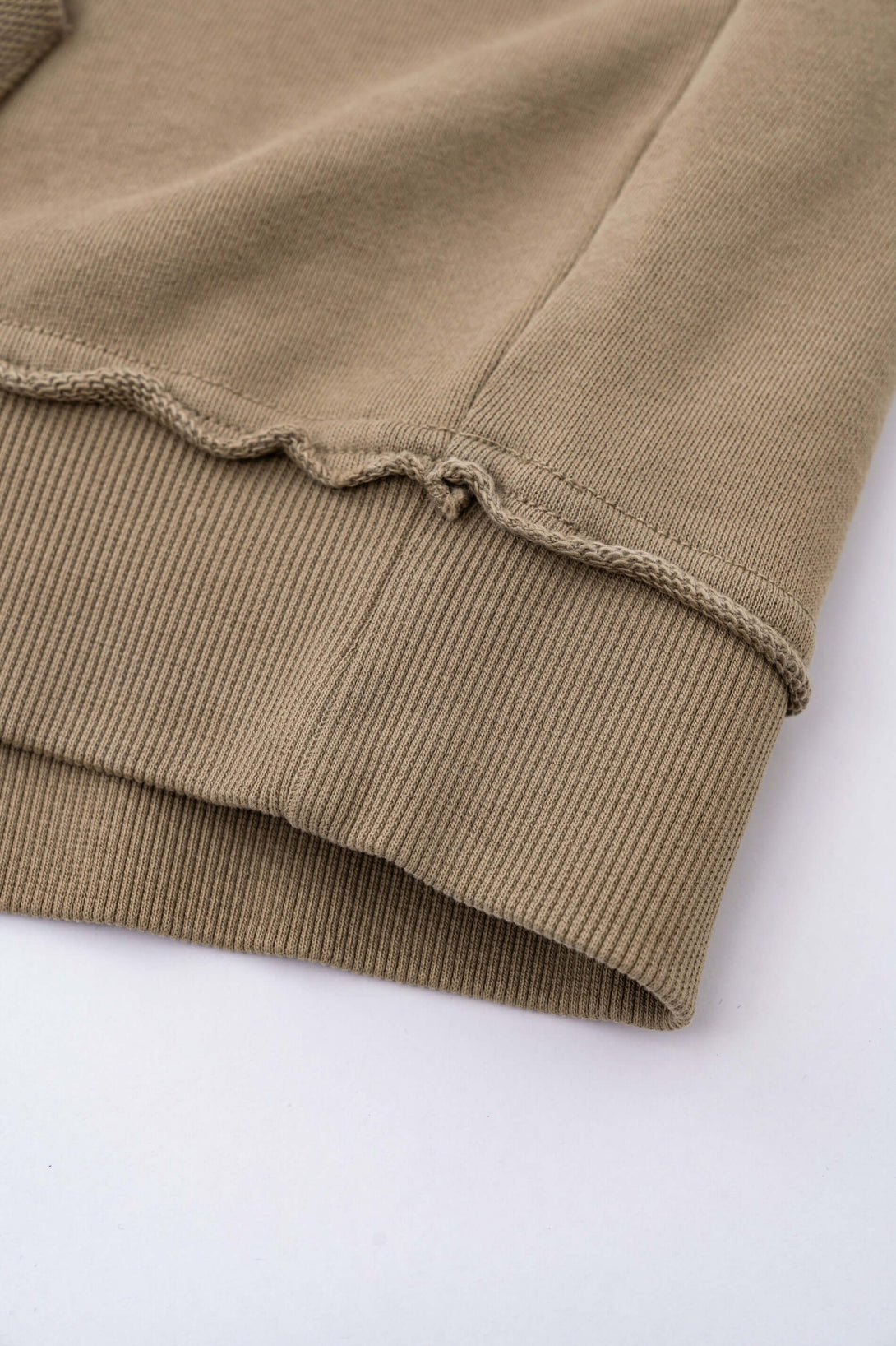 Vintage Batik Hoodie distressed hem and raw edge detail showcasing artisan craftsmanship.
