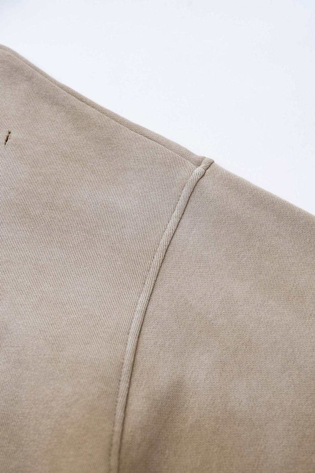 Vintage Batik Hoodie close-up of distressed shoulder detail and raw edge stitching.