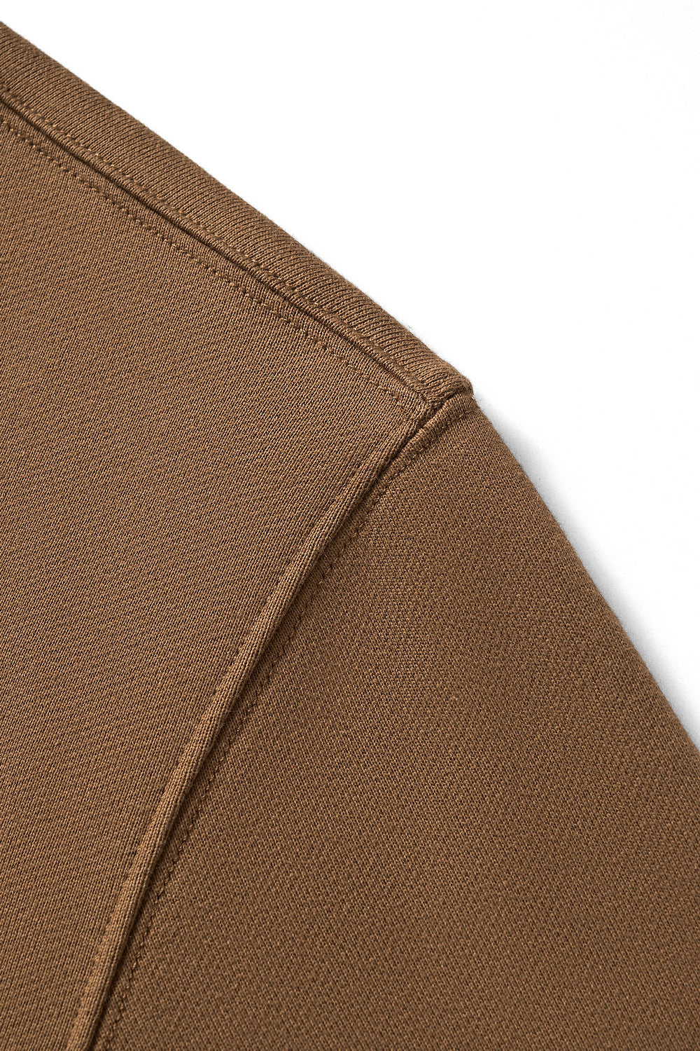 Shoulder construction detail of heavyweight pullover sweatshirt.