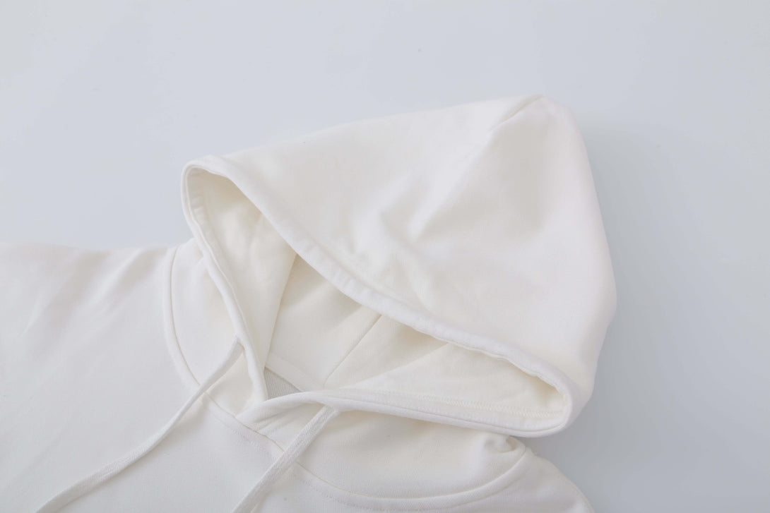 Hood construction detail with drawstring holes