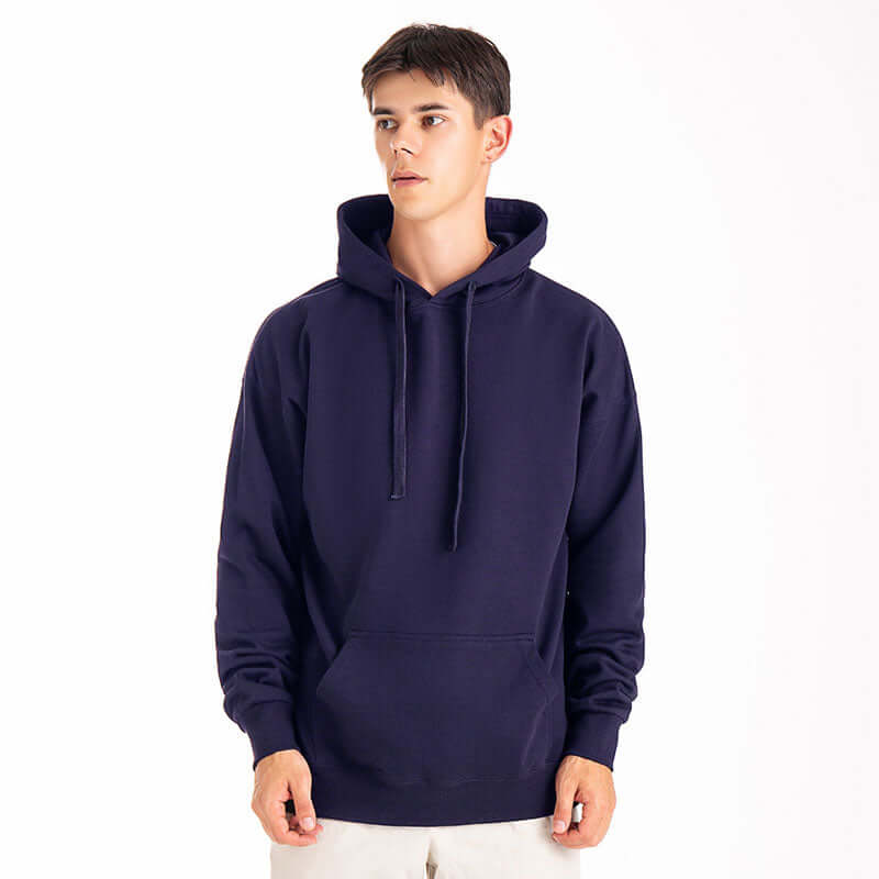 Man modeling navy blue hooded sweatshirt