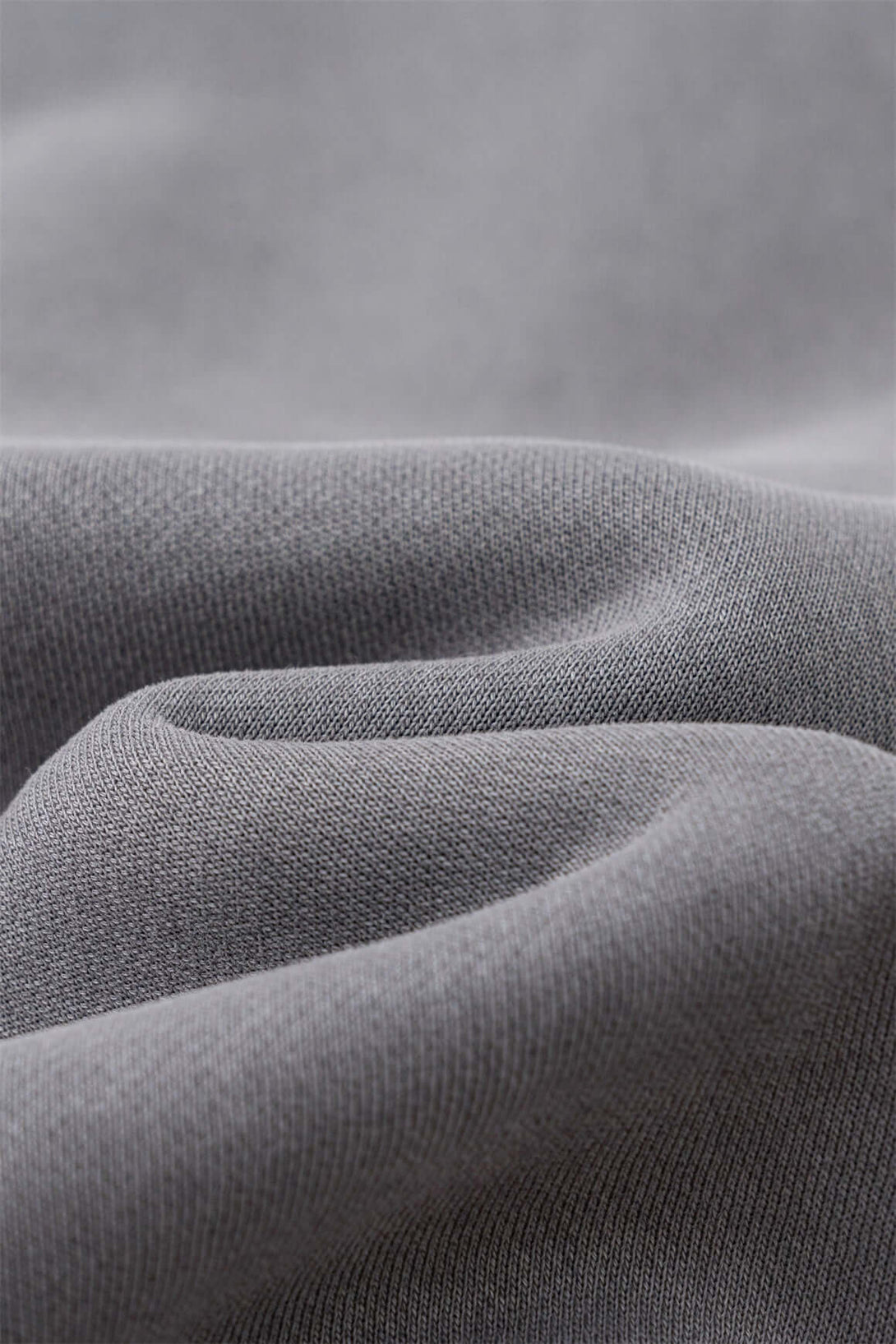 Double Zip Washed Hoodie fabric close-up showing soft, heavy 400g fleece texture for superior warmth.