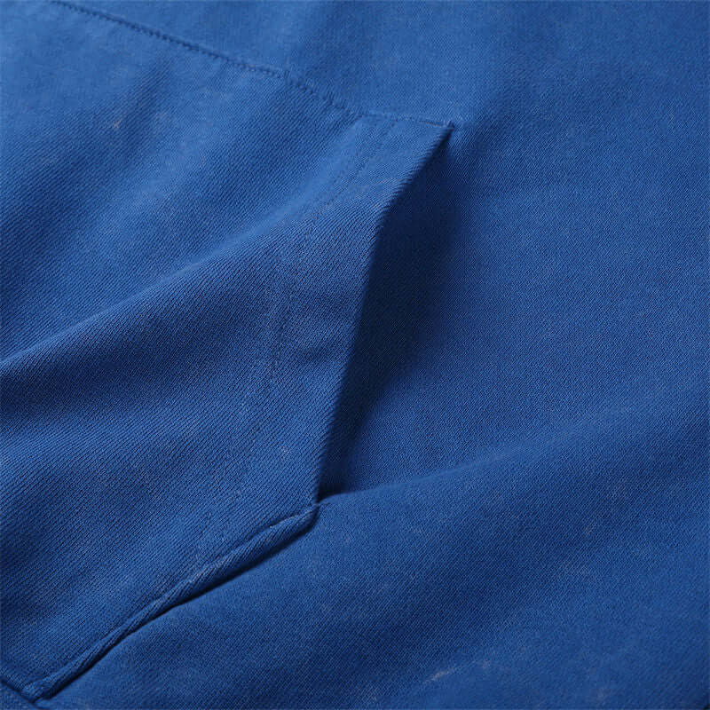 Kangaroo pocket detail on oversized unisex hooded sweatshirt