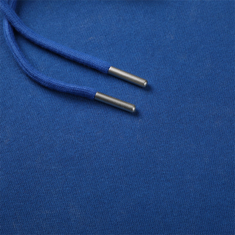 Metal-tipped drawstring ends on vintage wash cotton hoodie