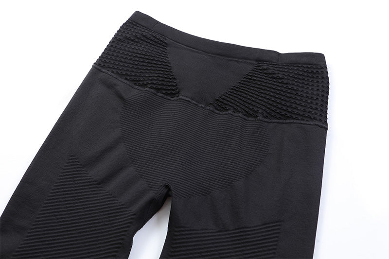 Detail of back waistband design on black shorts
