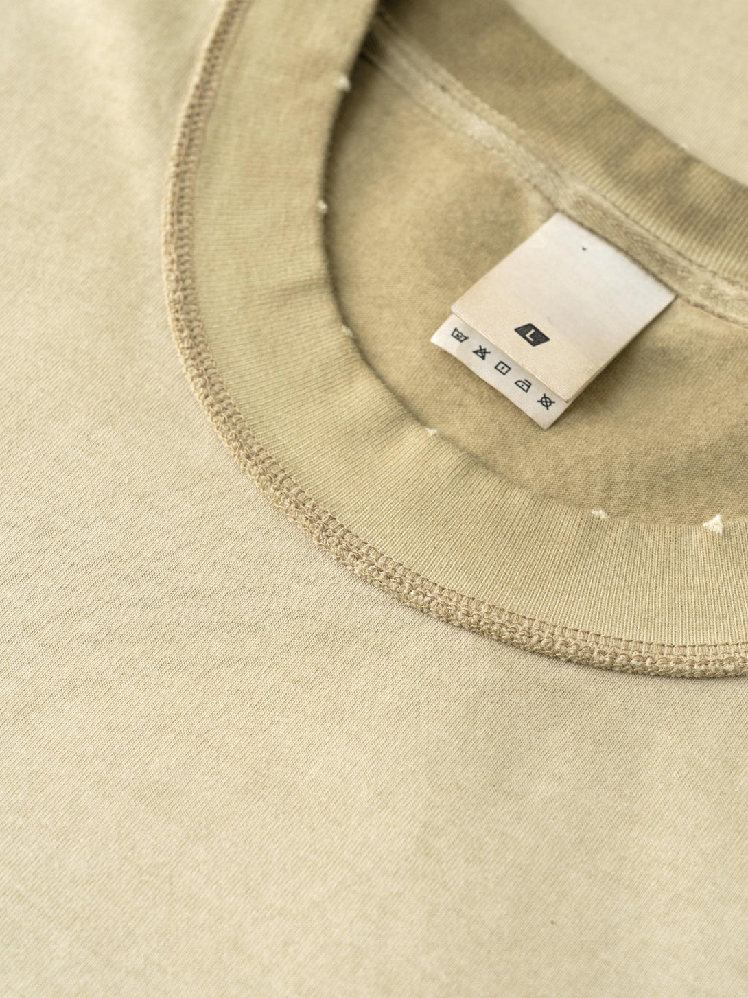 Khaki pigment-dye tee collar detail - Raw-edge neckline with distressed print for streetwear