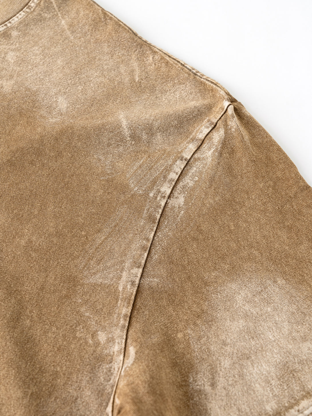 Artisan distressing on coffee brown tee sleeve - 100% cotton pigment-dye wash streetwear staple