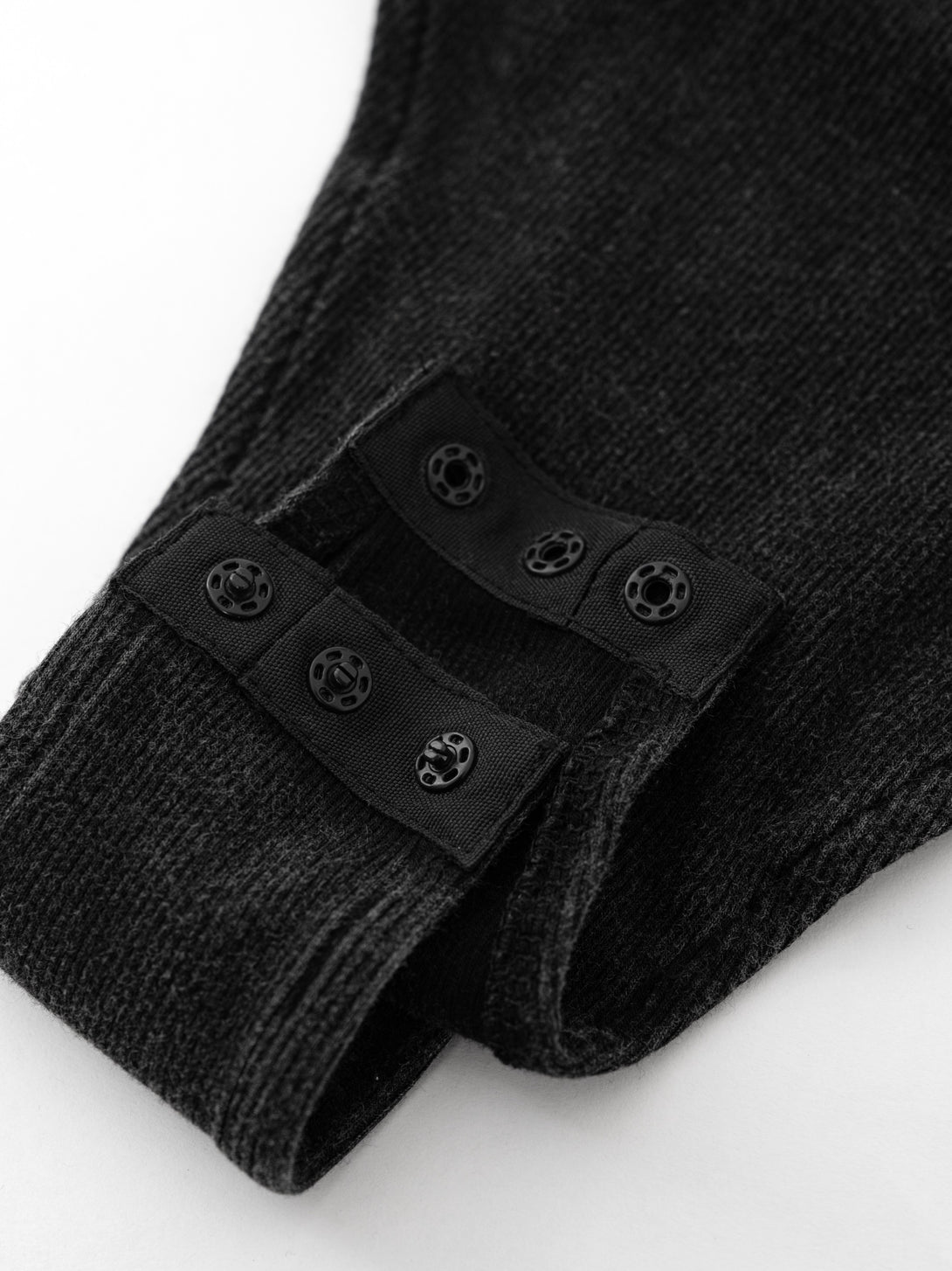 Double-needle hem on heavy wash cotton bodysuit