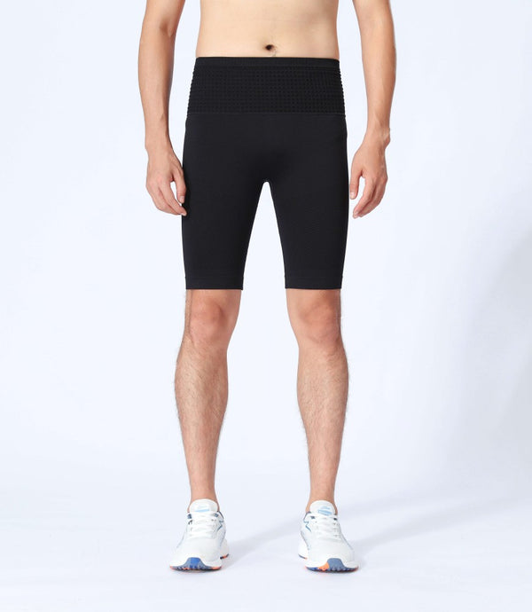 Model front view in black compression training shorts