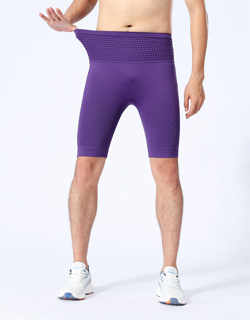 Male model wearing purple compression shorts front view