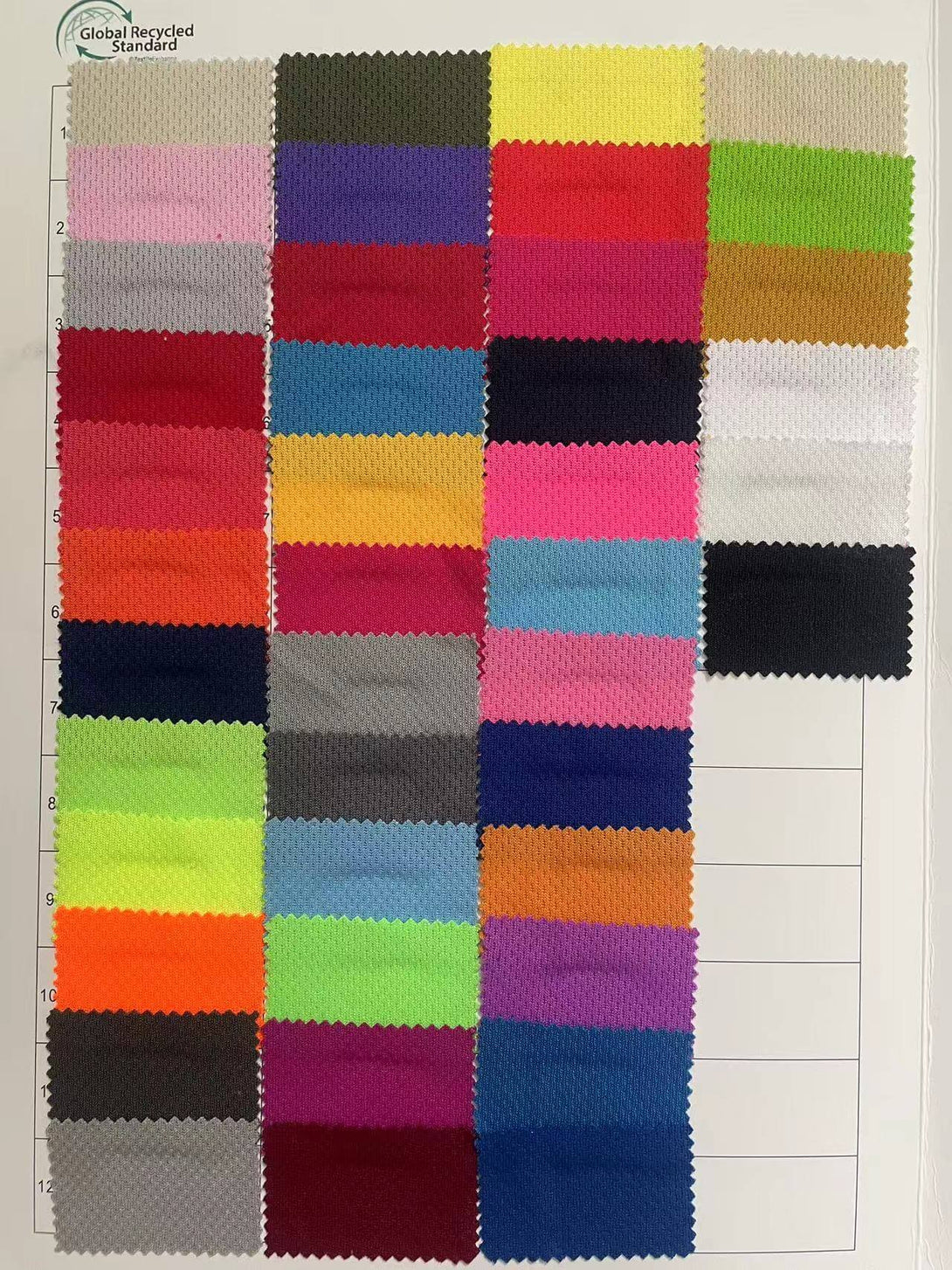 Color swatches of recycled materials for Recycled Polo Shirts in various shades.