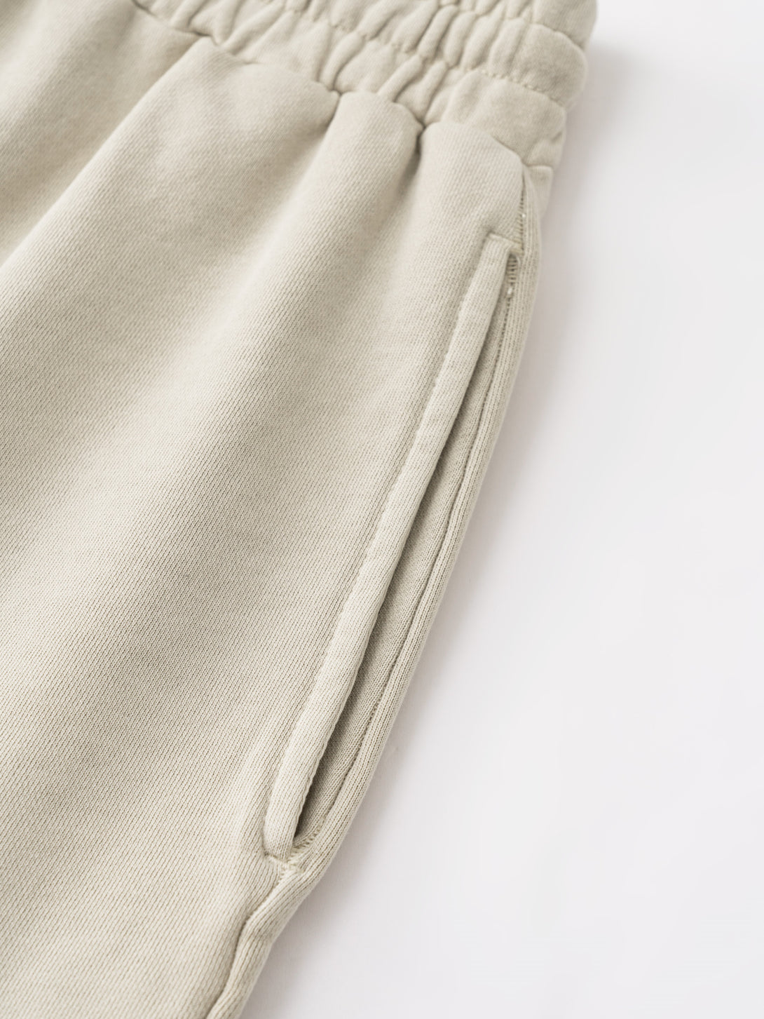 Triple-stitch reinforced front pocket