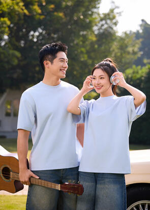 Unisex Off-White Cooling T-Shirt Worn by Male and Female Models