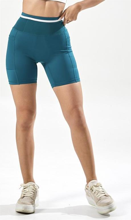 Copper green athletic compression shorts front