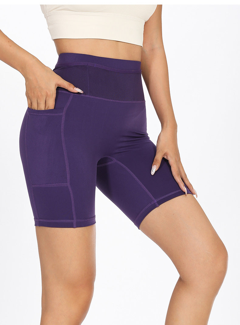 Side profile of purple women's compression shorts