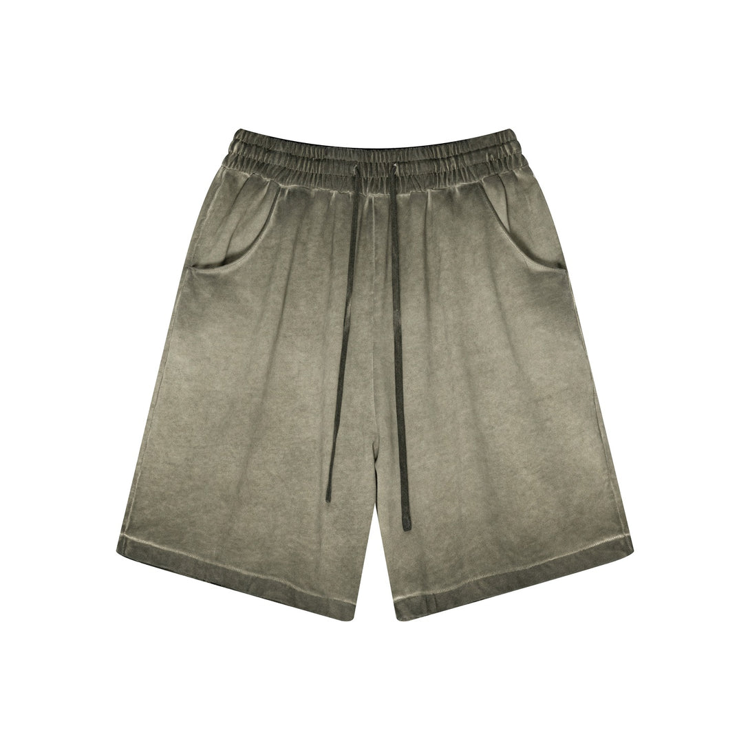 Army Green cotton shorts front view - distressed vintage wash streetwear style
