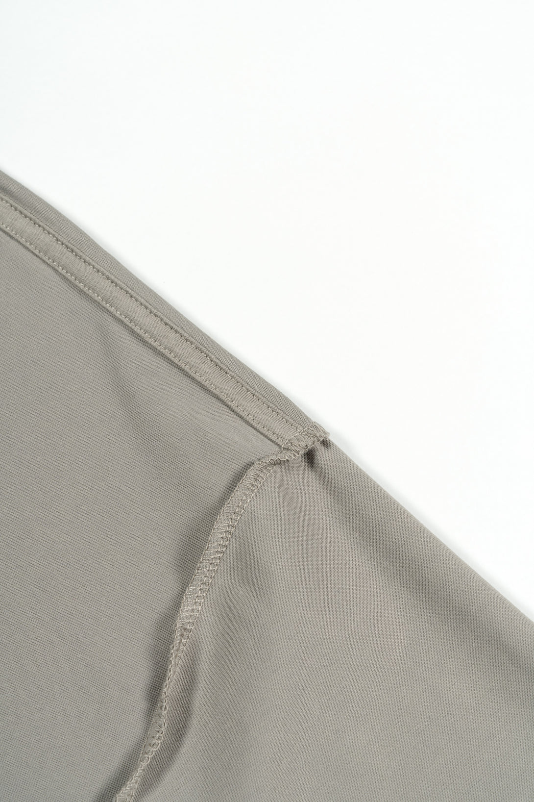 Reinforced sleeve hem detail on breathable tee