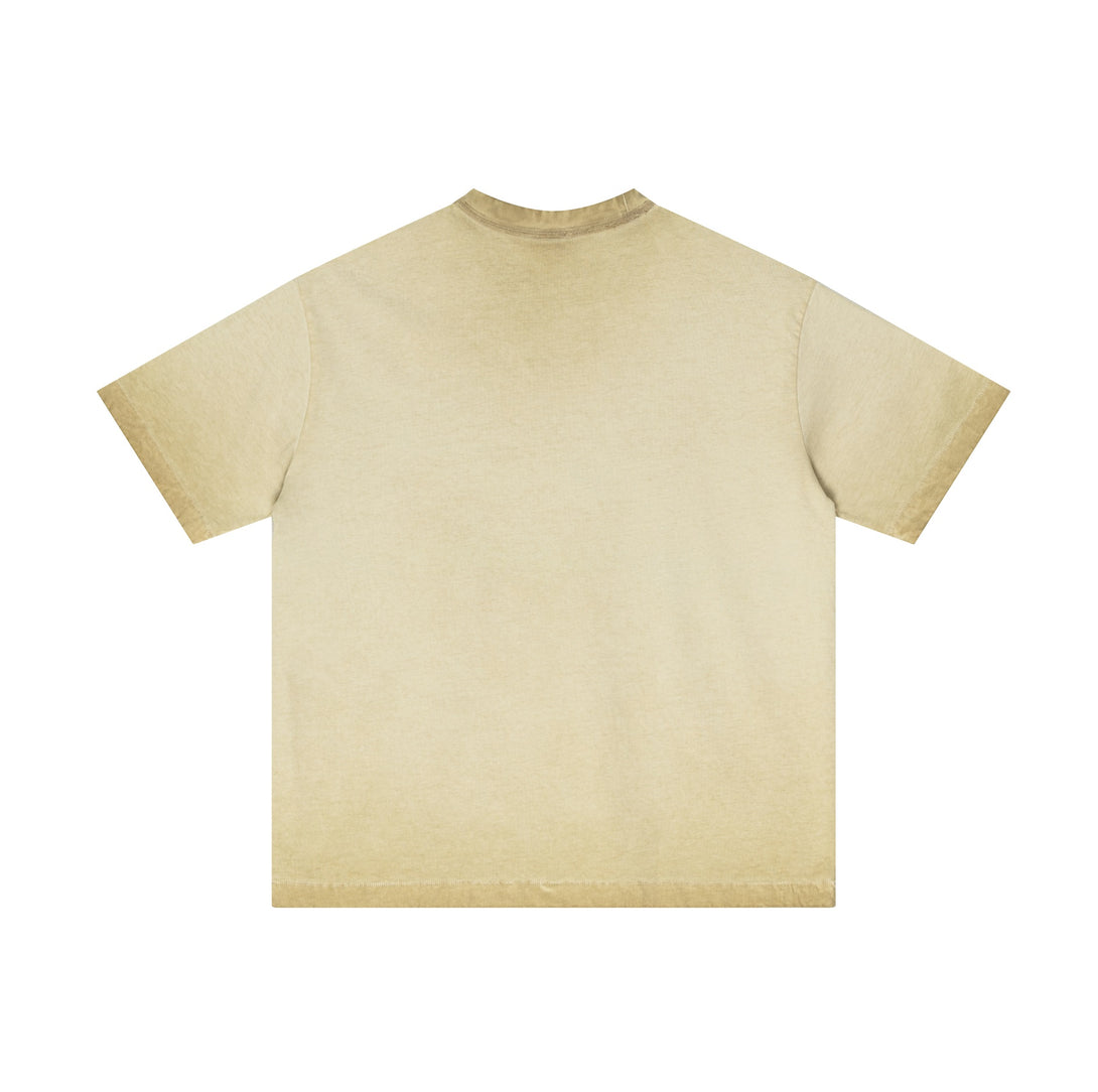 Back of khaki oversized t-shirt with reverse-distressed wash and raw-hem detailing. Bulk streetwear essential.