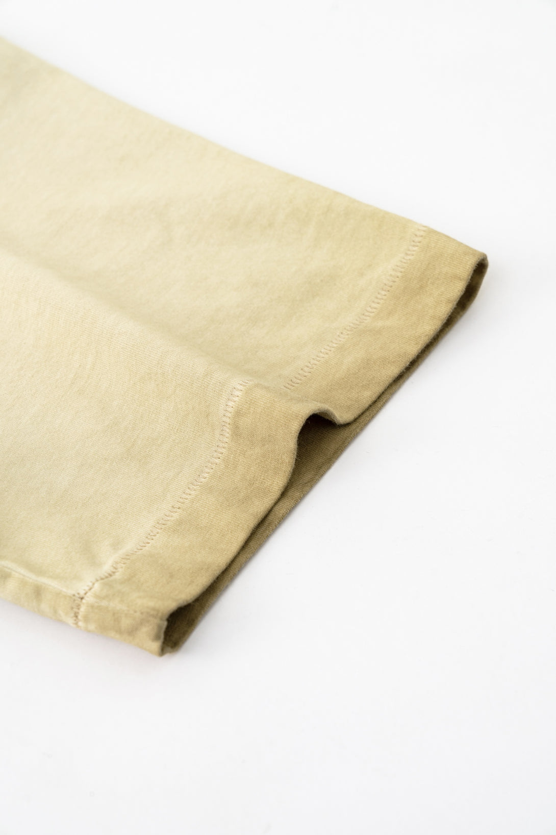 Khaki sleeve distress print close-up - Oversized tee with hand-brushed pigment texture | Bulk blank QC sample