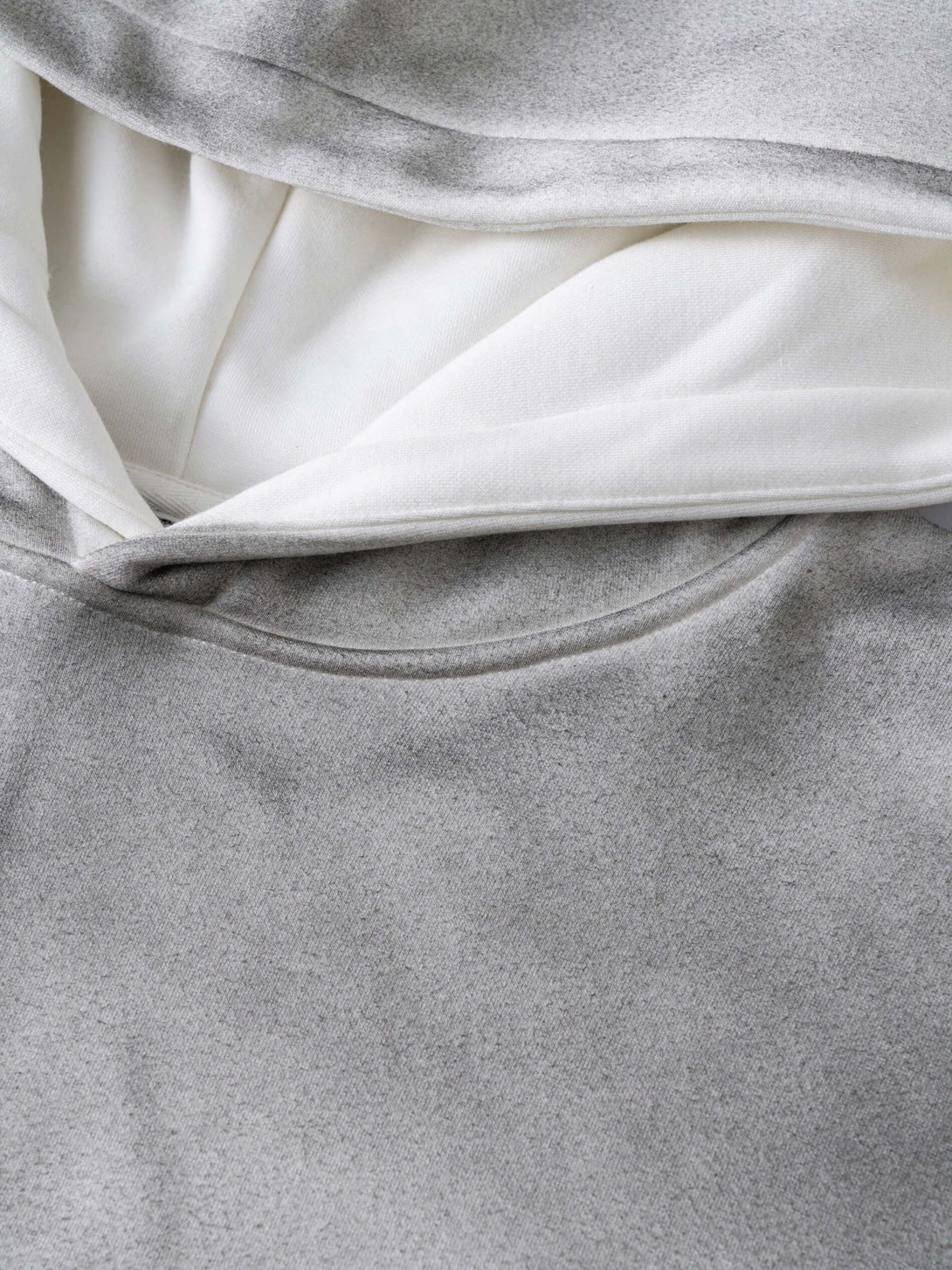 Men's 340g Grey Camo Weighted Hoodie showing the intricate fabric and design details of the pullover.