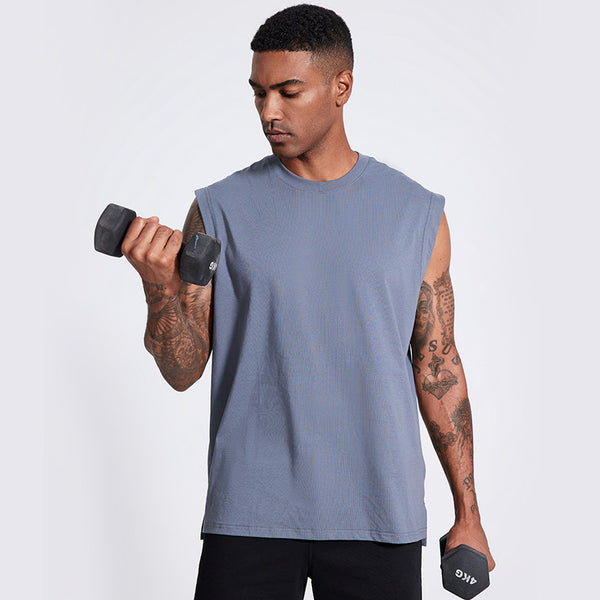 Male model wearing grey athletic vest front pose