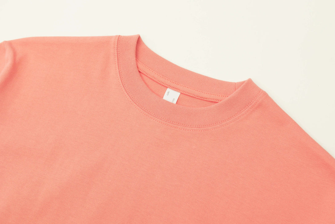 Coral red t-shirt ribbed collar close-up