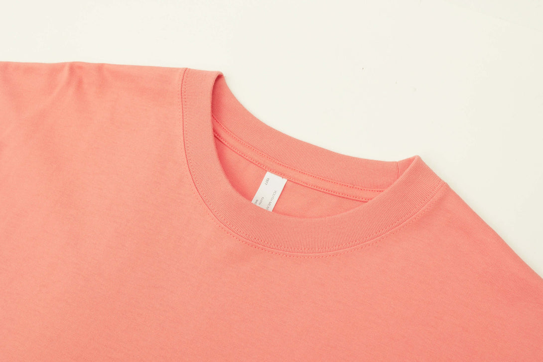 Coral red t-shirt ribbed collar close-up