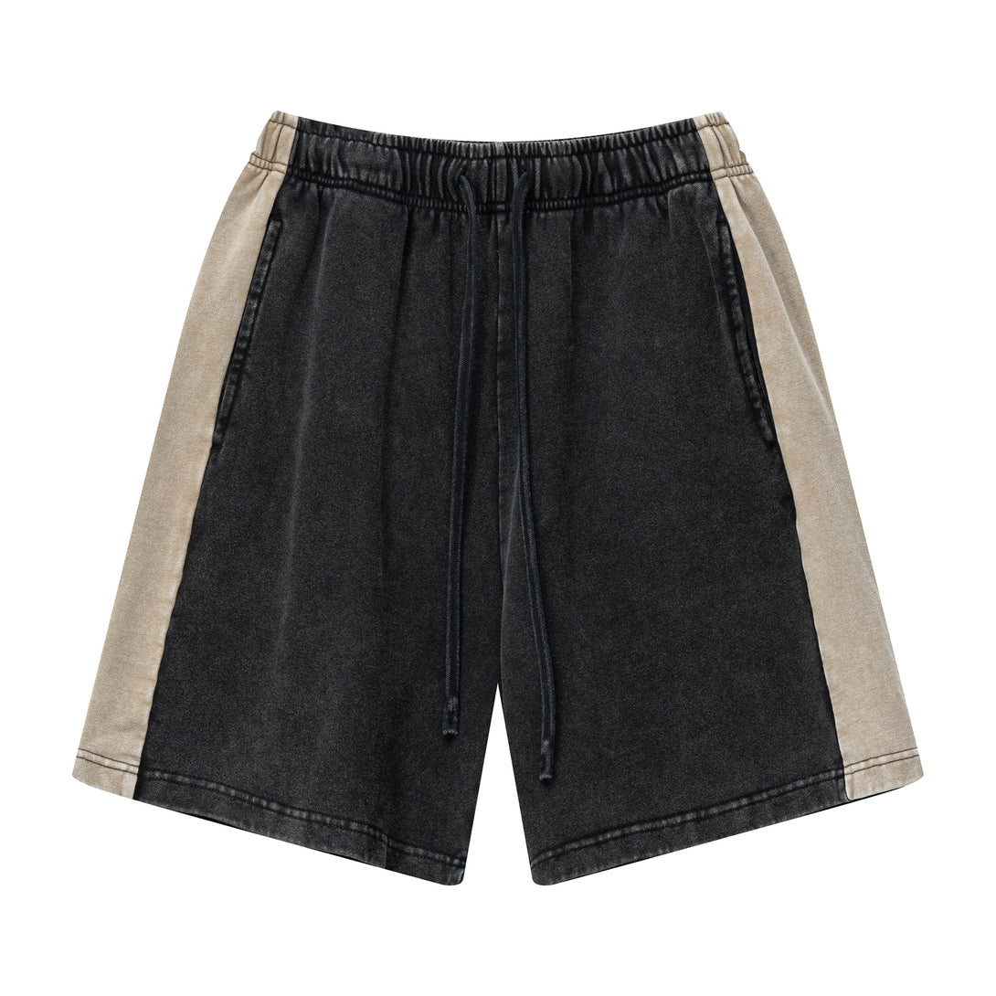 Front view of heavy wash unisex retro shorts in Black/Khaki colorblock