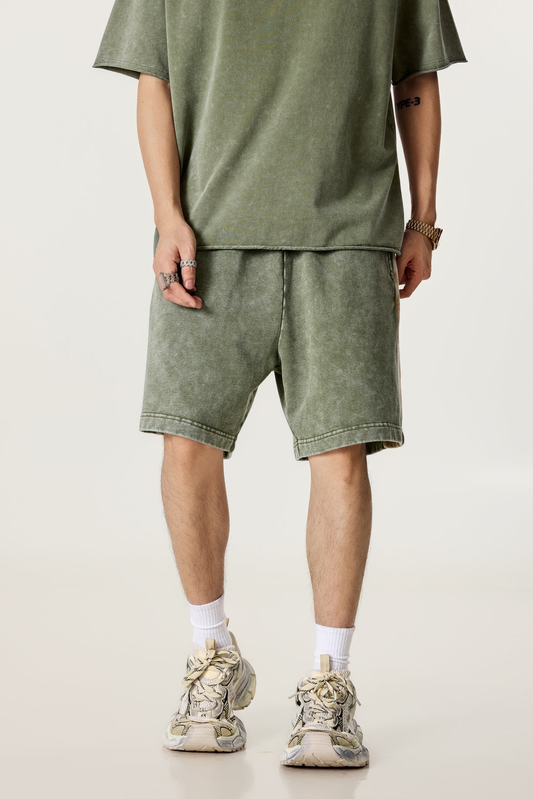 Model wearing unisex retro shorts, front view
