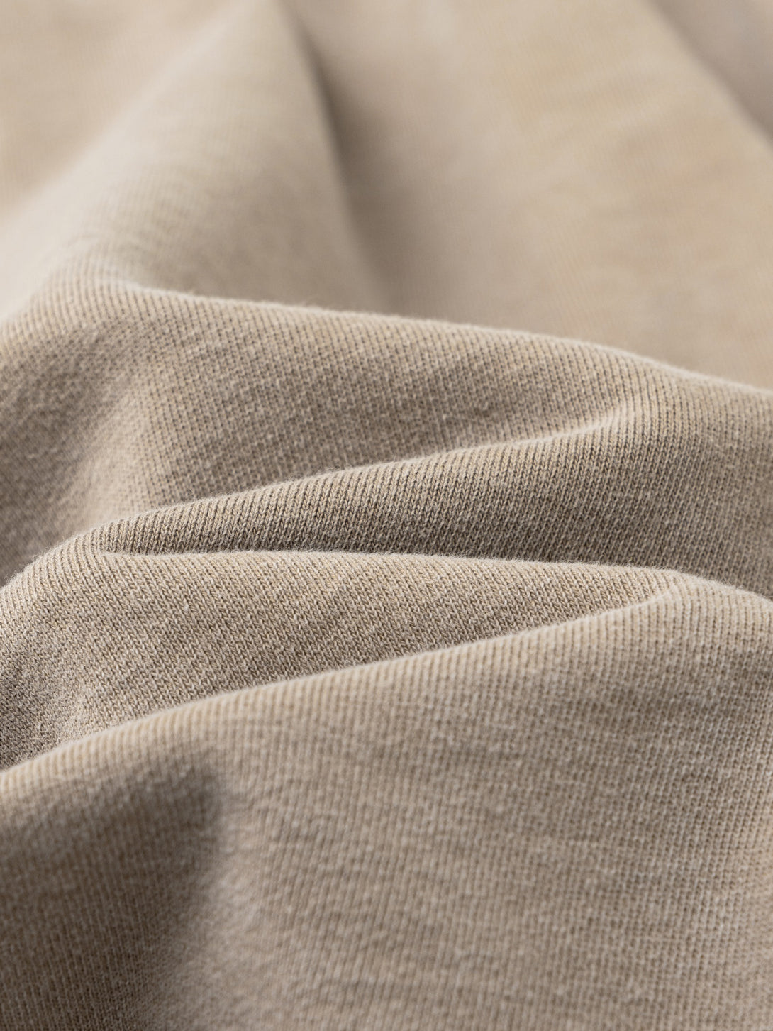 Texture close-up of 330g snow wash cotton
