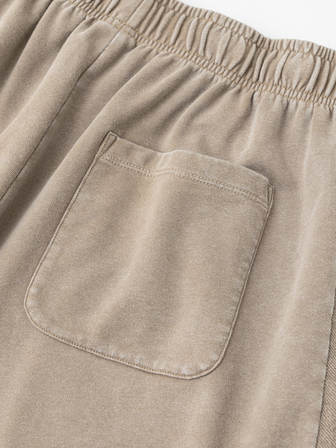 Back pocket design with heavy wash texture